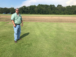 Gary Youmans showing a field at Green Acres Turf Farm.