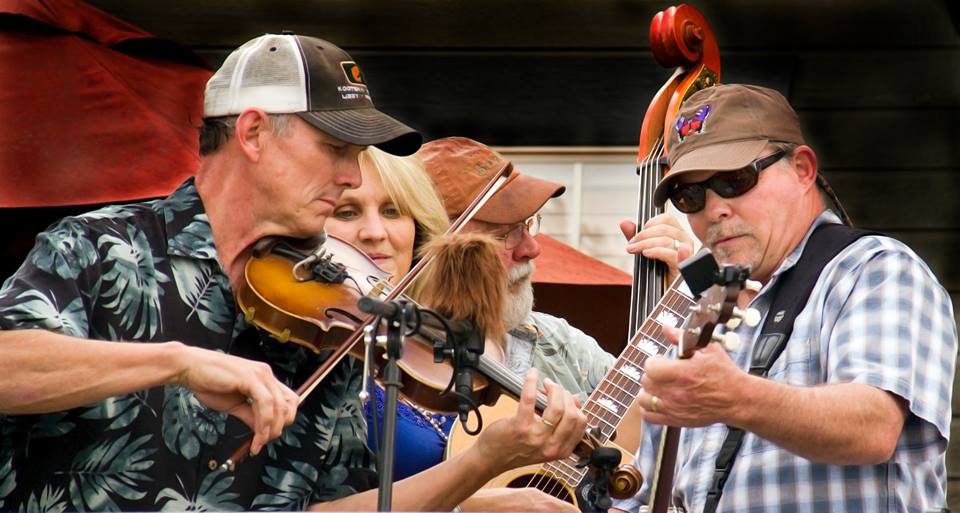 Mark Miller (left) on stage with Gone Before They Got Here, band
